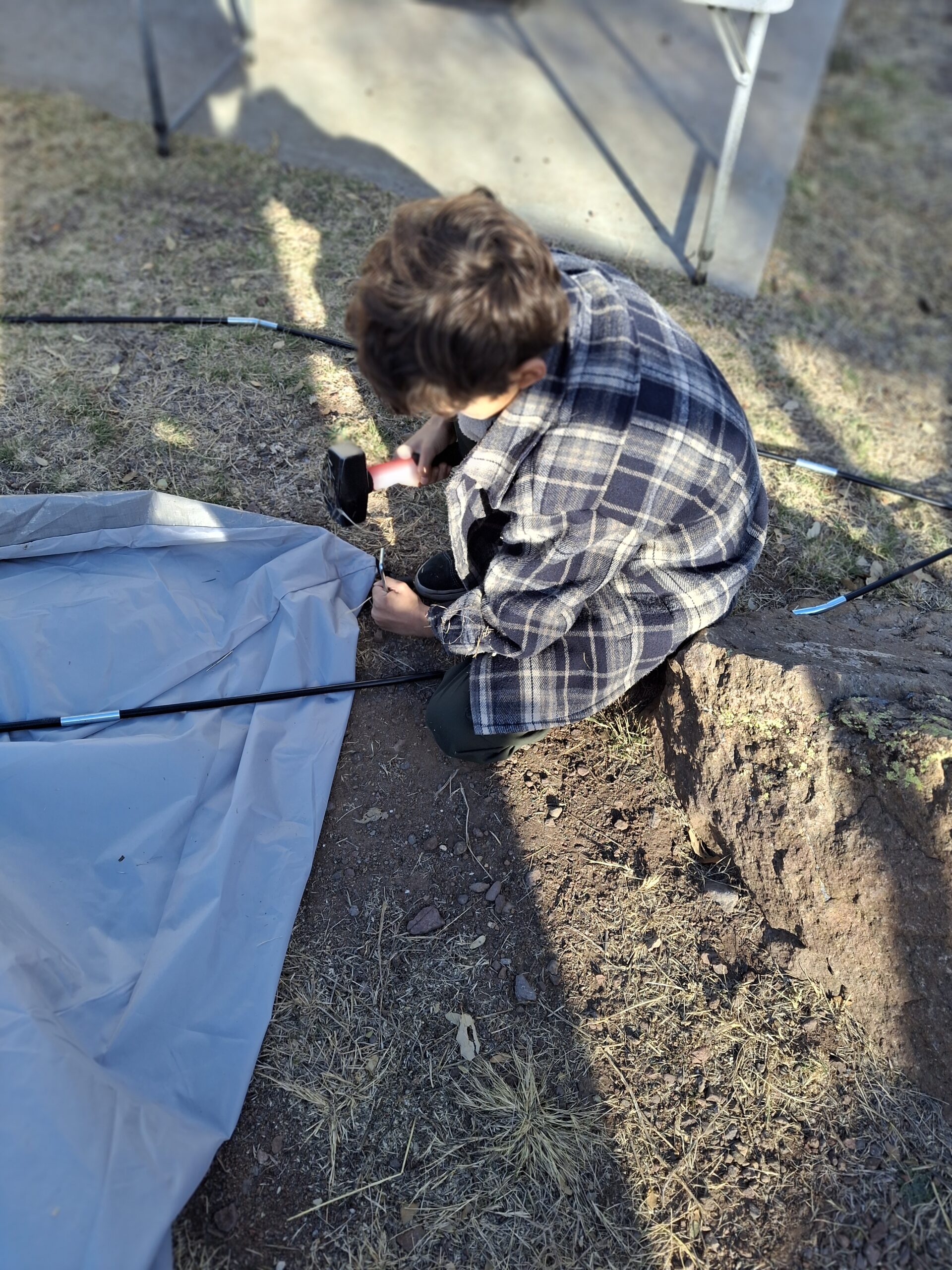 HELPING DAD WITH THE TENT